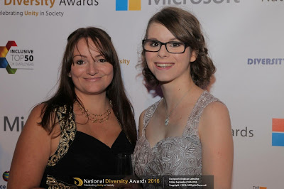Chloe stood next to her mum at the national diversity awards