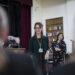 Chloe in focus giving a speech to school children